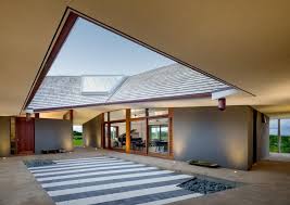 A Courtyard Sits At The Centre Of Hut House In Hawaii By Johnston Marklee Hut House Johnston Marklee Hawaiian Homes