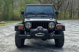 Image result for Brilliant Black 2003 Jeep