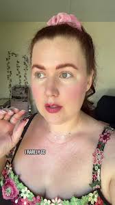 Clean girl face, covered in flowers, and about to buy a new book