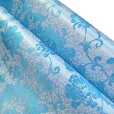 This metallic brocade has a beautiful shimmer to it. Amazon Com Tong Gu Chinese Satin Faux Silk Fabric Floral Brocade Dress Clothes Cheongsam Tang Suit Diy Retro Blue