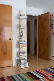 Click here for more details on how to make this yourself. How To Build A Vertical Book Tower How Tos Diy