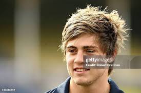 Lachlan Mitchell runs with the ball during a Melbourne Rebels Super... News  Photo