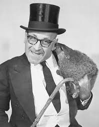 Groundhogs are also known as woodchucks… his handlers insist, whimsically, that punxsutawney phil is over 100 years old and that he drinks an elixir of life each year which adds seven more years to his life. Groundhog Club President Sam Light Age 79 Hold The Woodchuck Named Punxsutawney Phil During Ground Hog Day Cer Groundhog Day Vintage Photos Punxsutawney Phil