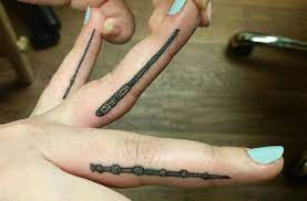 145 Most Magical Harry Potter Tattoos You Ll Want To See Spiritustattoo Com Finger Tattoos Wand Tattoo Tiny Harry Potter Tattoos