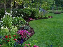 The garden is full of potted plants, and perfectly trimmed plants that are growing in the ground. Best Garden Border Ideas Diy Network Blog Made Remade Diy