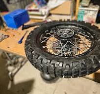 Pinched tube causes tire leak around valve stem
