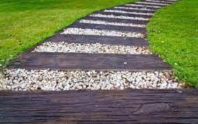 Beats Riding Up A Muddy Hill Diy Stone Walkway Walkway Landscaping Backyard Garden Landscape