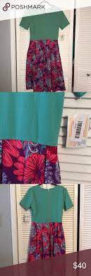 Check spelling or type a new query. I Just Added This Listing On Poshmark Lularoe Amelia Dress Mint Tip Floral Skirt Size L Shopmycloset Poshmark Fashio Amelia Dress Floral Skirt Floral Tops