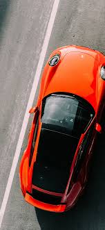 Explore the 21023 wallpapers for apple/iphone xr (828x1792) and download freely everything you like! Orange Vehicle On Road Close Up Photography Iphone X Wallpapers Free Download