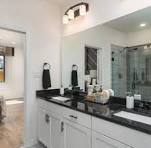 75 Bathroom with White Cabinets and Black Countertops Ideas ...