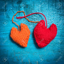 The first knit in public event was organized in 2005 by danielle landes. Valentine S Day Colorful Knitted Hearts Red Heart On The Blue Boards Valentines Day Heart Pendant Red Heart Valentine Cards Space For Text Eighth Of March International Women S Day Stock Photo Picture And