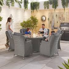 Browse outdoor fire pits and fire tables including portable wood fire pits and gas fire pit tables to add fire and heat to your exterior patio space. Thalia 6 Seat Dining Set With 1 5m Round Firepit Table