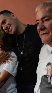 Andry Romero, the gay makeup artist who was deported from Sam Diego to a  mega prison in El Salvador, is back in his home country. He reunited with  his parents today. , #AndryHernandezRomero ...