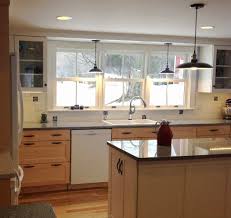 Flush mount lighting and recessed fixtures take advantage of the limited available space found above the kitchen sink. 25 Elegant Lighting Over Kitchen Sink Kitchen Sink Lighting Stylish Kitchen Modern Farmhouse Kitchens