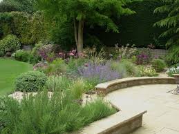 See How We Transformed Two Redundant Ponds Into A Low Maintenance Gravel Garden With A Stone Water Fe Front Yard Landscaping Garden Design Backyard Landscaping