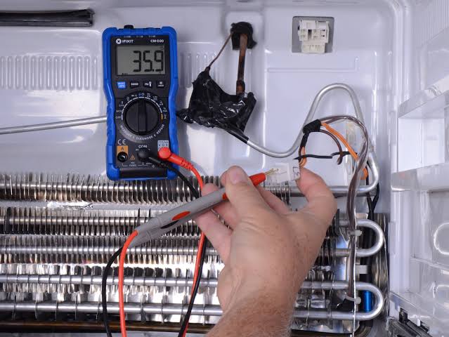 Testing defrost heater element resistance, AI generated