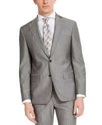 Skinny fit suits feature narrower shoulders, slimmer lapels and a shorter length jacket, along with trousers that are slim through the leg and hem. Dkny Men S Slim Fit Stretch Suit Jackets Reviews Suits Tuxedos Men Macy S