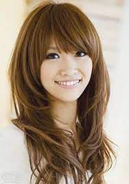 What are the most flattering hairstyles for an oval face? Cute Long Hairstyles With Bangs And Layers For Oval Faces Asian Women With Thick Wavy Hair In Casual Days Haircuts For Long Hair Hair Styles Long Hair Styles