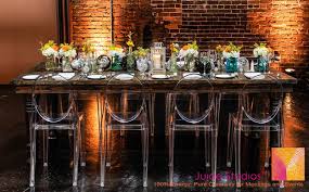 Juice Studios Signature Event Farm Tables Ghost Chairs Colorful Eclectic Floral Tablescapes Mod Rustic Farm Table Ghost Chairs Industrial Wedding Decor