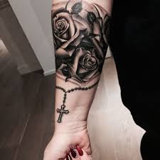 A rose and cross tattoo, or a skull and rose tattoo, is usually a memento of a loved one who has passed away. Tattoo Uploaded By Magi Arm Roses 3d Rosary Cross Hearts Blackandgray Love Tattoo 300261 Tattoodo