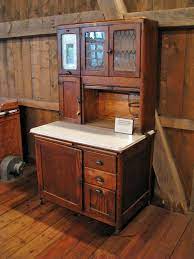 Cabinets painted white or stained with a light, natural wood stain are very popular for their 'shabby chic' appearance when antiqued. Pin On Decorating