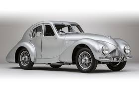 Image result for Pale Primrose 1957 Aston Martin