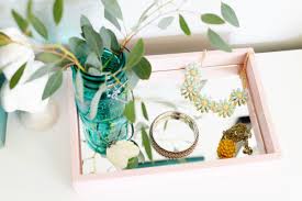 Especially when all this tray needed was 4 wooden balls (with a small flat side on top), spray paint and a 4×6 piece of decorative paper. Diy Mirrored Vanity Tray