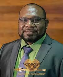 A NEW COMPLEX TO ACCOMMODATE MARKHAM ADMINISTRATION OPENED The Koni Iguan  Haus, a modern Markham District Administration complex located at Mutzing  Station in the Markham Valley, Morobe Province, was inaugurated