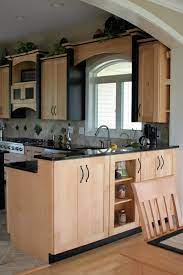 Accent kitchens and baths loves to help you build your new home spaces. Natural Maple Kitchen Cabinets With Black Accent Trim Pieces And Black Granite Countertops Maple Kitchen Cabinets Maple Kitchen Grey Oak Wood Flooring