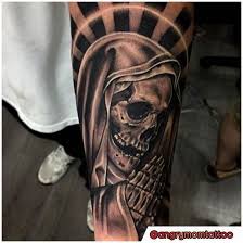 Santa Muerte Tattoo Storia Significati E Oltre 30 Idee Per I Tuoi Tatuaggi Chicano Ta Sant In 2020 Chicano Tattoos Ink Master Tattoos Dragon Tattoo Realistic