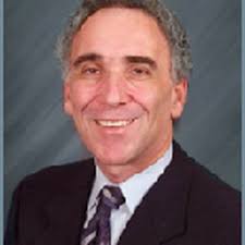 THE WEINSTEIN REFRACTIVE CENTER: LEWIS J. WEINSTEIN, M.D