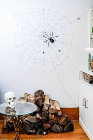 If you need some cheap room decor for halloween, check out this. Wall Sized Halloween Spider Web The Art Of Doing Stuff