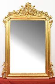 This Mirror Features A Gold Leaf Frame Decorated With Scrolls Cherubs Flowers And Leaves The Backside Of The Piece Is Miroir Antique Miroir Trumeau Miroir