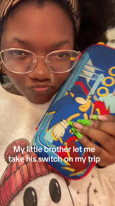 Brother Waits to Open Switch Gift