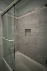 Porcelain floor tile on ditra membrane underlayment. Small Bathroom With 12x24 Tile Novocom Top