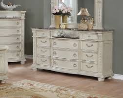 While most bedroom dressers and chests are made from wood, a plastic storage dresser is a great way to keep closets organized. Stanley Dresser Antique White Crown Mark Furniture Furniture Cart