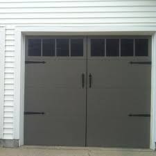 Don't split the wall in half and paint the bottom one your accent color can be the trim details on your door, the kick plate edging on the wall, or any other small feature. Painted My Garage Doors To Look Like Carriage Doors Garage Doors Carriage Doors Garage Door Styles