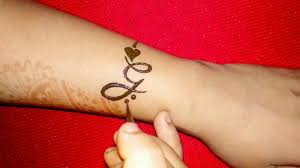 Their unique dye serves as temporary body art that guests will enjoy sporting even after the party's over. G Letter Henna Tattoo Design Youtube
