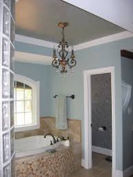 Choosing paint colors for the bathroom are tricky but with our tips about lighting and things to think about can help you better choose the perfect color. Tan Cream Tile Blue Walls And White Tub Hmmm A Bit Too Much But Good Colors Together For Relaxing Bath Bathroom Colors Colored Ceiling Home