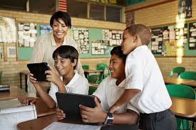Image result for image of a TEACHER UTILIZING INSTRUCTIONAL MATERIALS to teach biology