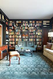 Collecting an assortment of sturdy wooden bookcases from your favorite secondhand sources and then painting or staining them to match is a better option. Most Amazing Home Libraries Modernize