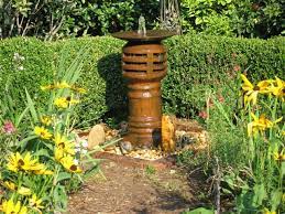 This Is A Fountain Made From An Old English Chimney With A Disc Harrow Top Converted To A Fountain To Serve As A Bird Bird Bath Fine Gardening Outdoor Projects