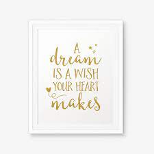 Oh, no matter how your heart is grieving, if you keep on believing the dream that you wish will come true. A Dream Is A Wish Your Heart Makes Nursery Gold Printable Etsy Princess Quotes Cinderella Quotes Girls Room Decor