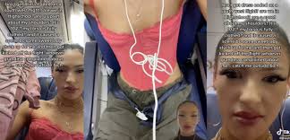 Southwest Airlines Allows "Lady In Red" To Fly In Revealing Attire But  Throws Off Seatmate Who Defended Her