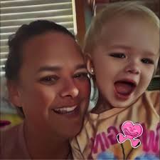 What is causing fever, head and body aches, vomiting, and severe diarrhea  in adults without respiratory symptoms?