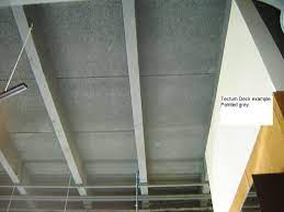 It was commonly used decades ago by school boards as a cost saving mechanism, because of its weight, r value, and appearance as a ceiling. Tectum Roof Decks New Century Roofing