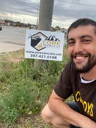 Where is the Core Concrete LLC sign located?