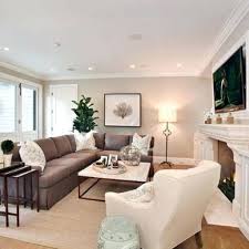 Any suggestions for paint colors that will complement the couch, but won't leave us with a room dominated by white/cream walls, ceiling, and floor? Inspirational Living Room Ideas Living Room Design Grey Living Room Brown Couch