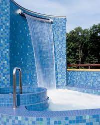 Other Swimming Pool Amenities Such As An Outdoor Shower This One Is Exceptional With Its Cascading Water Foun Pool Designs Swimming Pool House Pool Waterfall