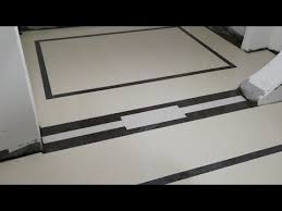 But on this bathroom wall, the white marble tiles have gray veins and black grouting. Flooring Tiles Black And White Show Patti Design Youtube